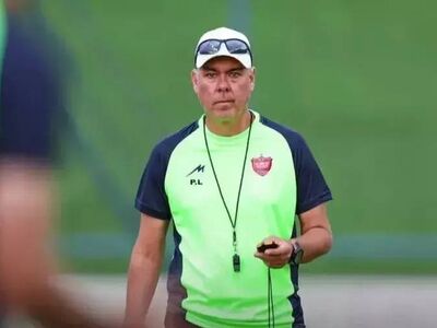 مربی پرسپولیس با پیراهن ملی/ عکس