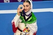 تقدیم مدال‌‌های جهانی به کوچکترین شهید جنگ و دختر ایران