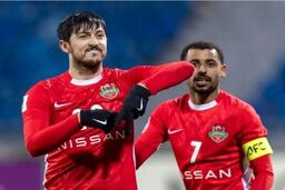 تصویر سردار آزمون روی پوستر بازی قهرمانی شباب الاهلی و العین