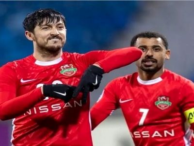 تصویر سردار آزمون روی پوستر بازی قهرمانی شباب الاهلی و العین