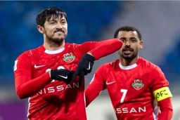 تصویر سردار آزمون روی پوستر بازی قهرمانی شباب الاهلی و العین